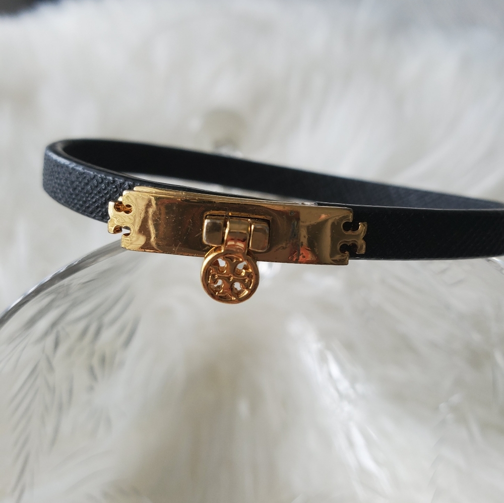 Black and gold Tory Burch bracelet